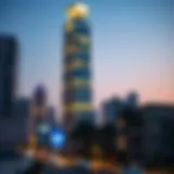 Dunya Tower Illuminated at Dusk Dunya Tower at dusk showcasing its illuminated facade
