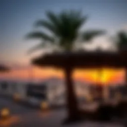 Scenic view of Barasti Beach with vibrant sunset