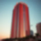 The stunning facade of Marina Gate Tower reflecting the sunset