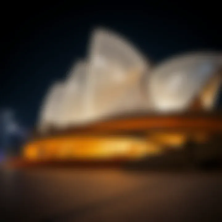 The intricate design of the Dubai Opera building illuminated at night