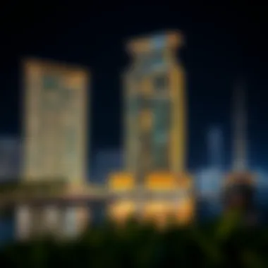 Nighttime illumination of the Marina Pearl Building accentuating its modern aesthetics